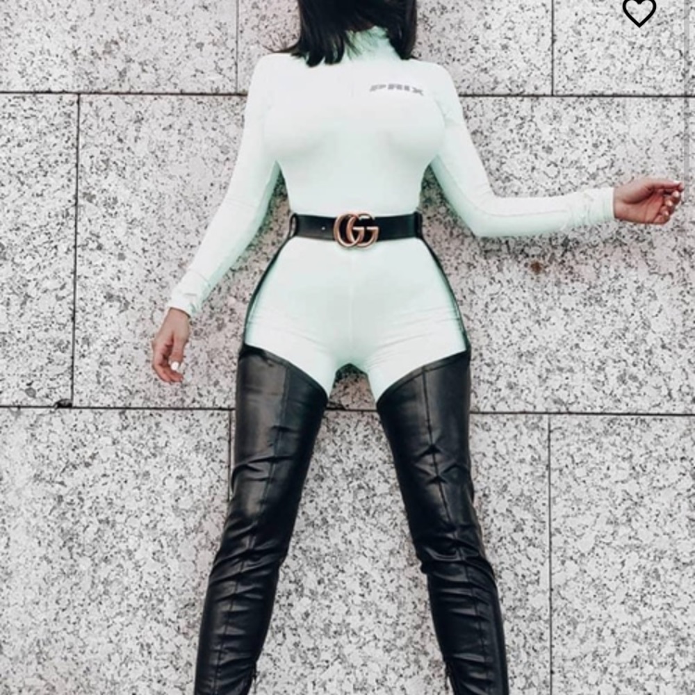 Sexxy , thigh high black stiletto boot.